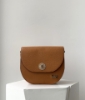Picture of Curved cross body flap bag